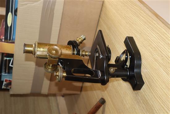 A Bausch & Lomb oak cased microscope